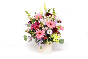 Naklejka na ściany i meble Bouquet of flowers in the box isolated on white background