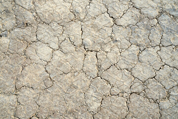 Dry cracked earth background.