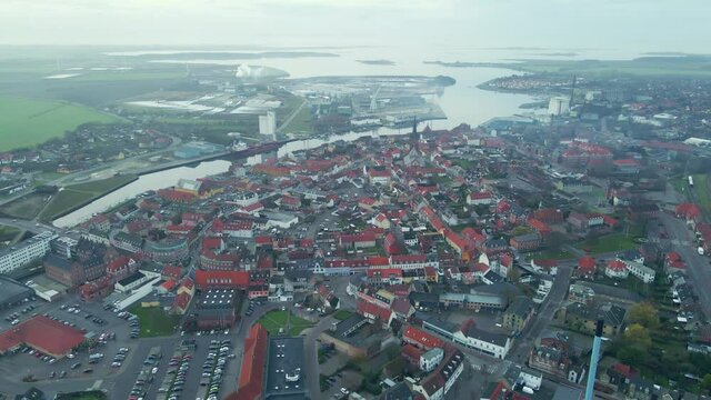 Small Danish suburban medieval town. 4K aerial footage.