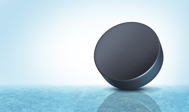 Hockey puck background on an ice rink with blank copy space as a winter team sport 