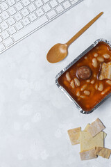 Lunch at work place Beans with chorizo and meat