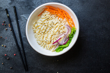 rice or wheat noodles cellophane pasta vegetables ready to eat on the table for healthy meal snack outdoor top view copy space for text food background image rustic