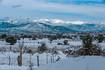Fototapeta na wymiar Snowy landscape after the storm Filomena, Galapagar, Madrid, Spain.