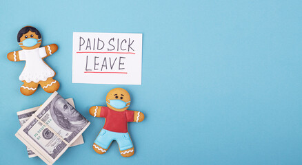 Gingerbread men in a mask with a wad of money and the inscription paid sick leave