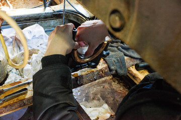 Fototapeta premium Repair of a diesel generator converted to gas.
