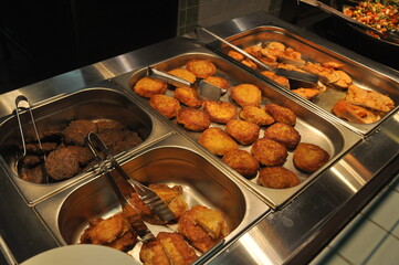 Fried Cutlets and Patties in a Buffet Serving Tray
