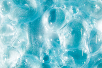 Liquid cream gel, green blue cosmetic texture with bubbles