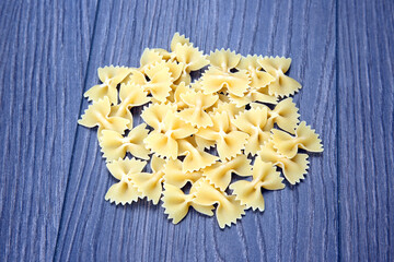 italian pasta on a wooden table. flour products and food in cooking