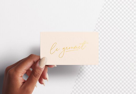 Woman's Hand Holding Business Card Mockup