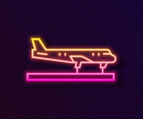 Glowing neon line Plane icon isolated on black background. Flying airplane icon. Airliner sign. Vector.