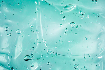 Liquid cream gel, green blue cosmetic texture with bubbles