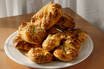 Delicious challah knots in the sun.