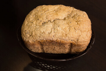 Bread from bread machine. Home baking bread on a plate. Bread in bread maker