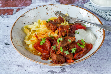 Venison goulash with tagliatelle pasta