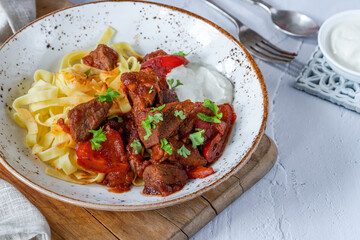 Venison goulash with tagliatelle pasta