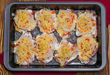 Cooking meat with pineapple vegetables and cheese