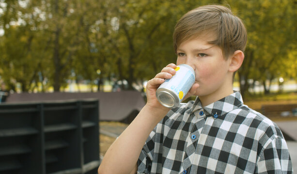 Boy Drinking Soda Water