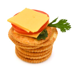 Delicious crackers with cheese on white background