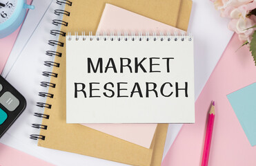 Notebook with Tools and Notes About Market Research