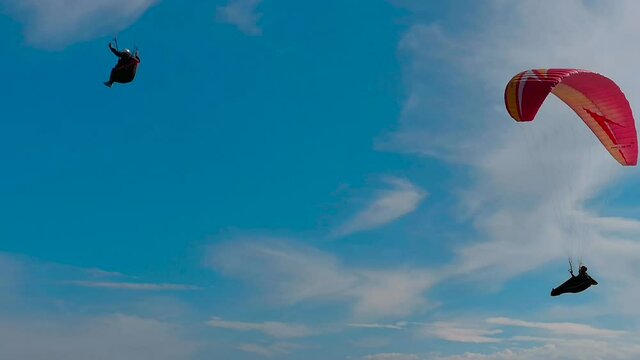 jumping sky parachute paragliding flying sport fly blue paraglider freedom clouds extreme air bird adventure flight skydiving cloud gliding parachuting activity high seagull fun sun wind