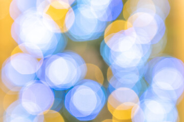 Bokeh background Blue glitter abstract lights. Festive blur. Defocused winter backdrop.