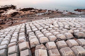 Reinforced concrete coastal fortification. Protective reinforcements from the erosion of sea banks from concrete.