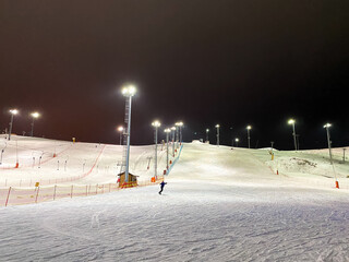 mountain ski slope in the evening