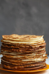 Shrovetide Maslenitsa Butter Week festival meal. Stack of russian pancakes blini. Rustic style, close up view