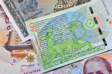 Fototapeta na wymiar some current georgia currency bills