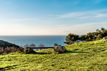 Tyrrhenian Sea seen from the hill of Populonia, municipality of Piombino, Tuscany, Italy. In the background, Capraia island, in the Tuscan Archipelago. 