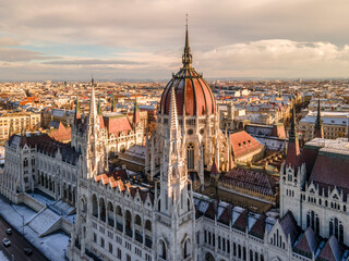 Fototapeta na wymiar Hungary - Beautiful snowy Budapest Parliament on a winter morning from a drone view