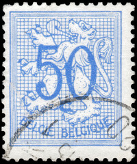 Postage stamp issued in Belgium the image of the Number 50 on Heraldic Lion, circa 1951