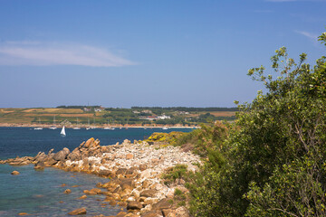 Fototapeta na wymiar St. Mary's Pool, Isles of Scilly, England, UK, on a calm Summer's day