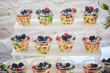 colored jellies in plastic cup for a baptism