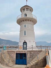 Fototapeta na wymiar lighthouse on the coast of island