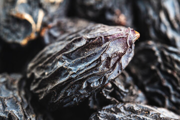 Dark blue raisins extreme close-up view
