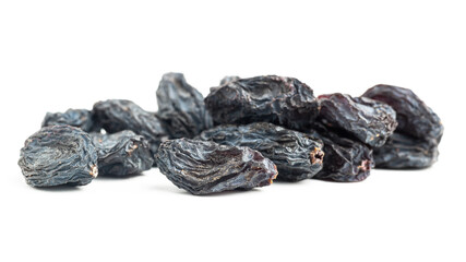Dark blue raisins isolated on white background