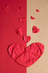 Fototapeta premium romantic red and camel card with red hearts of different sizes