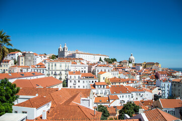 Fototapeta na wymiar Lisbon skyline from Alfama district with blue sky. Portugal city view