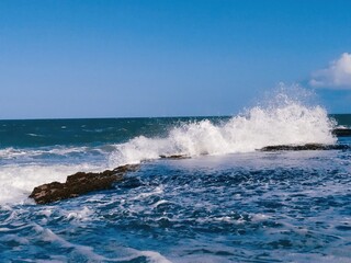 waves crashing on rocks