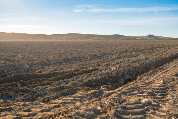 Agricultural field deeply plowed tillage after harvest