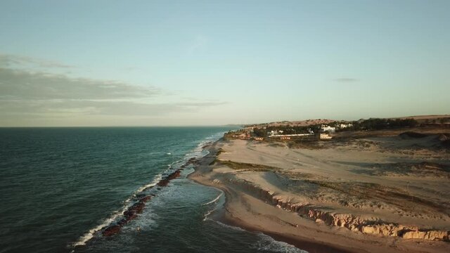 Aerial view by drone of Canoa Quebrada Beach in Cear&aacute;, Brazil
