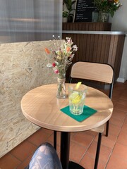 Coffee shop table with flower and bohemian style 