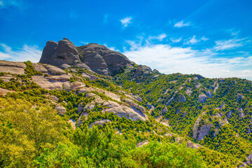 Fototapeta na wymiar Montserrat mountains near Benedictine abbey Santa Maria de Montserrat