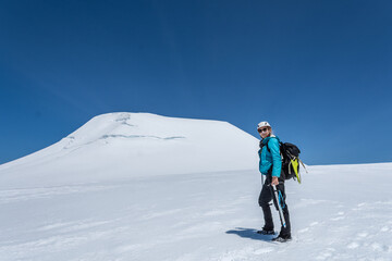 alpinist in the top of the mountain