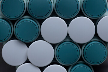 Abstract graphically organized circles of syringe self application pens. Studio medical equipment still life concept with auto-injector disposable devices. © Maarten Zeehandelaar