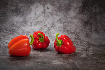 Red sweet Bulgarian pepper on a colorful background