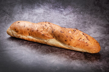 French bread baguette with onions on a colorful background