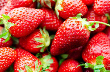 Background of fresh red strawberries ready to be eaten. 