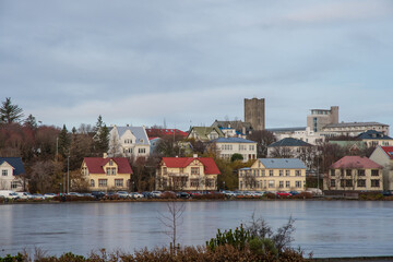 Buildings along Tjornin lake in Reykjavik Iceland